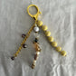 63fe71384f2da238419a4f9e_048064-butter-yellow-bag-charm-1_1762747154685.jpg