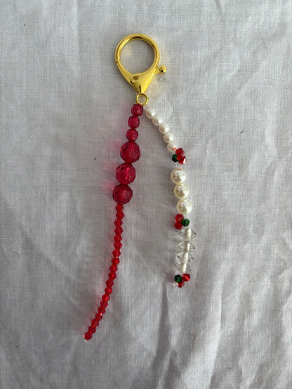 63fe71384f2da238419a4f9e_048064-cherry-bag-charm-1_1762747154687.jpg