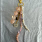 63fe71384f2da238419a4f9e_048064-pink-flower-bag-charm-2_1762747154692.jpg