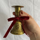 63fe71384f2da238419a4f9e_048071-brass-bell-candlestick-1_1762824077728.jpg