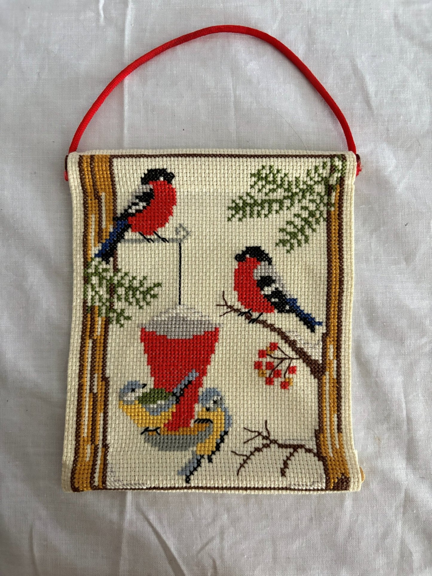 63fe71384f2da238419a4f9e_048076-cross-stitch-bird-feeder-2_1762825385908.jpg