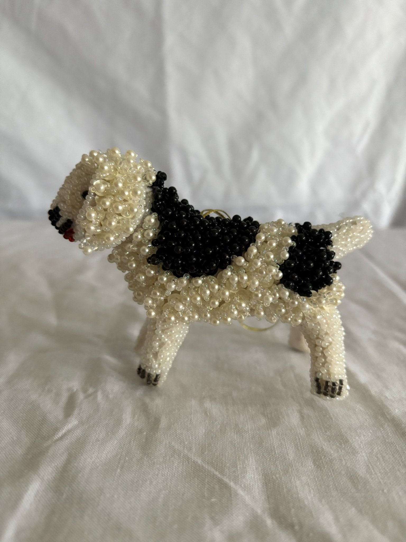 63fe71384f2da238419a4f9e_048082-beaded-dog-ornament-3_1763847989952.jpg