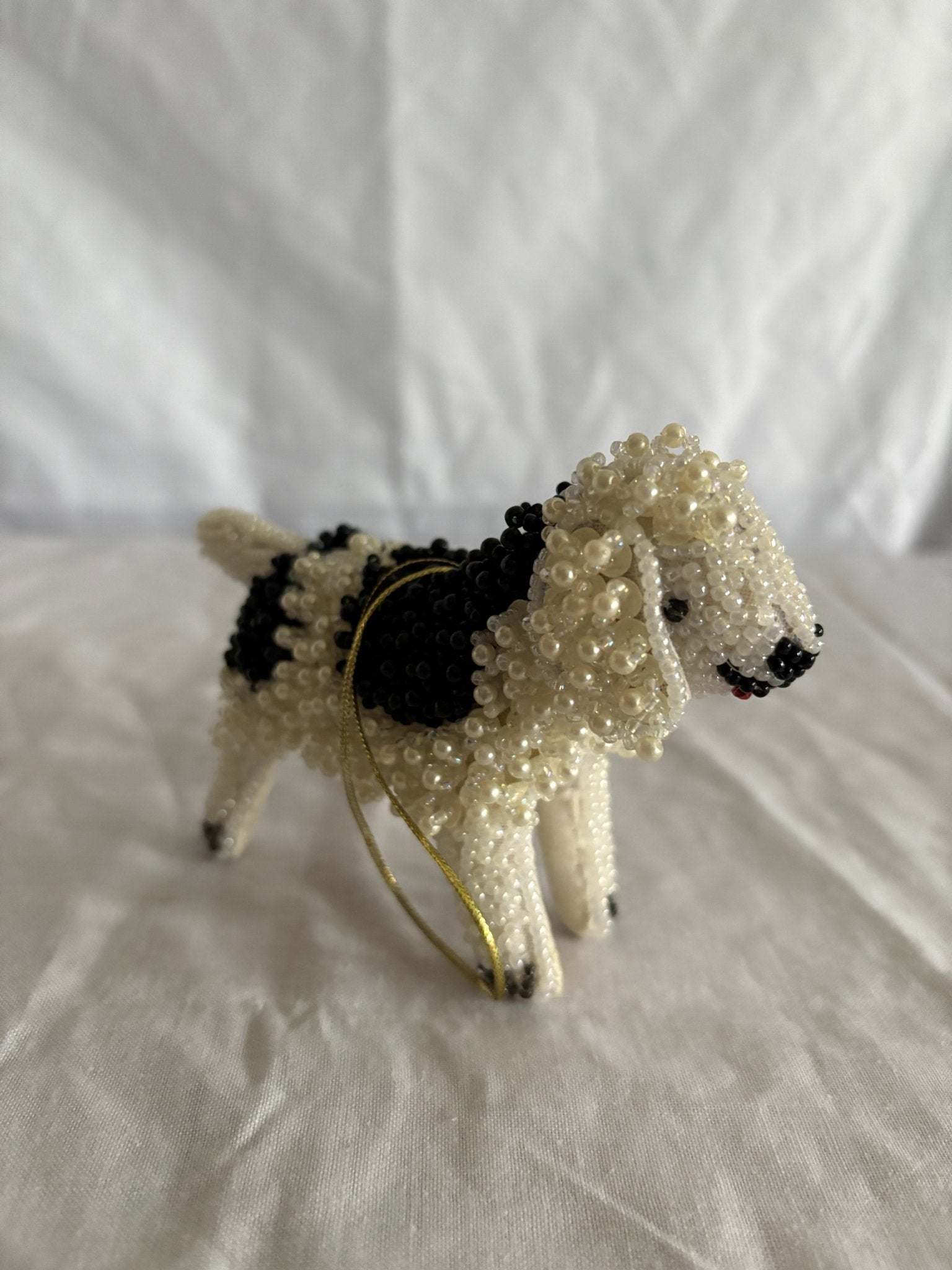 63fe71384f2da238419a4f9e_048082-beaded-dog-ornament-5_1763847989953.jpg
