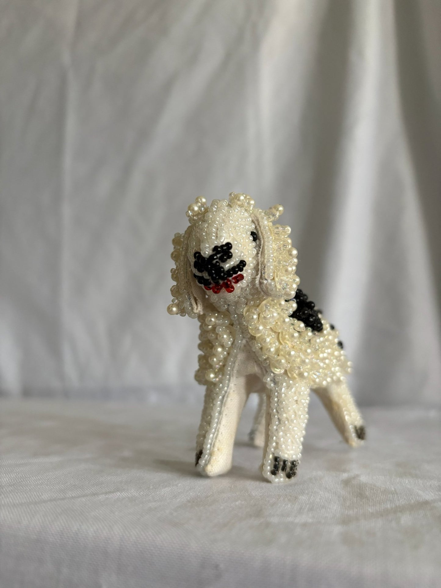 63fe71384f2da238419a4f9e_048082-beaded-dog-ornament-7_1763847989954.jpg