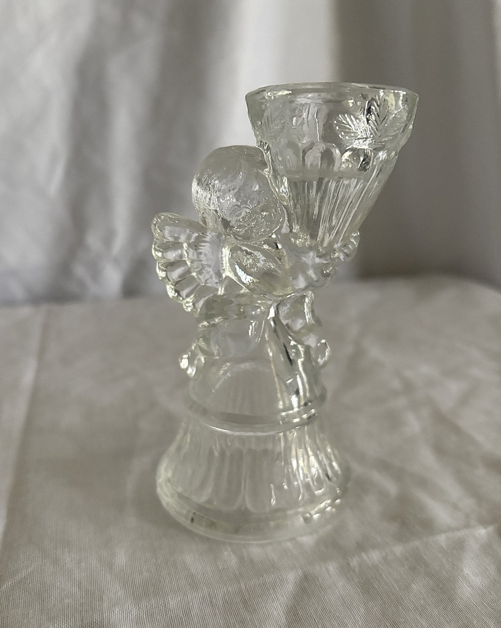 63fe71384f2da238419a4f9e_048083-glass-cherub-candle-holders-4_1763848170396.jpg