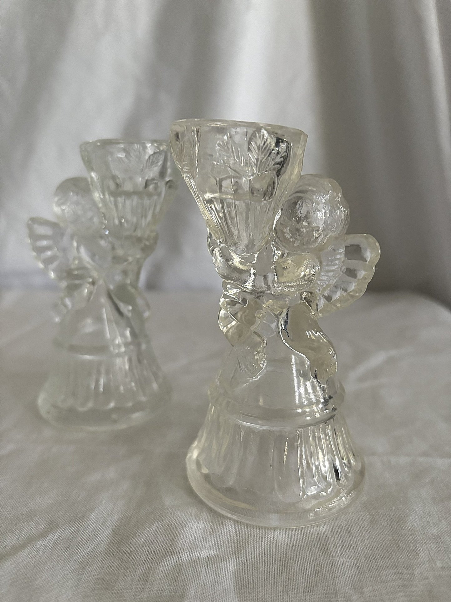 63fe71384f2da238419a4f9e_048083-glass-cherub-candle-holders-5_1763848170397.jpg