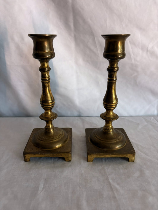 63fe71384f2da238419a4f9e_048092-brass-candlesticks-1_1767397387262.jpg