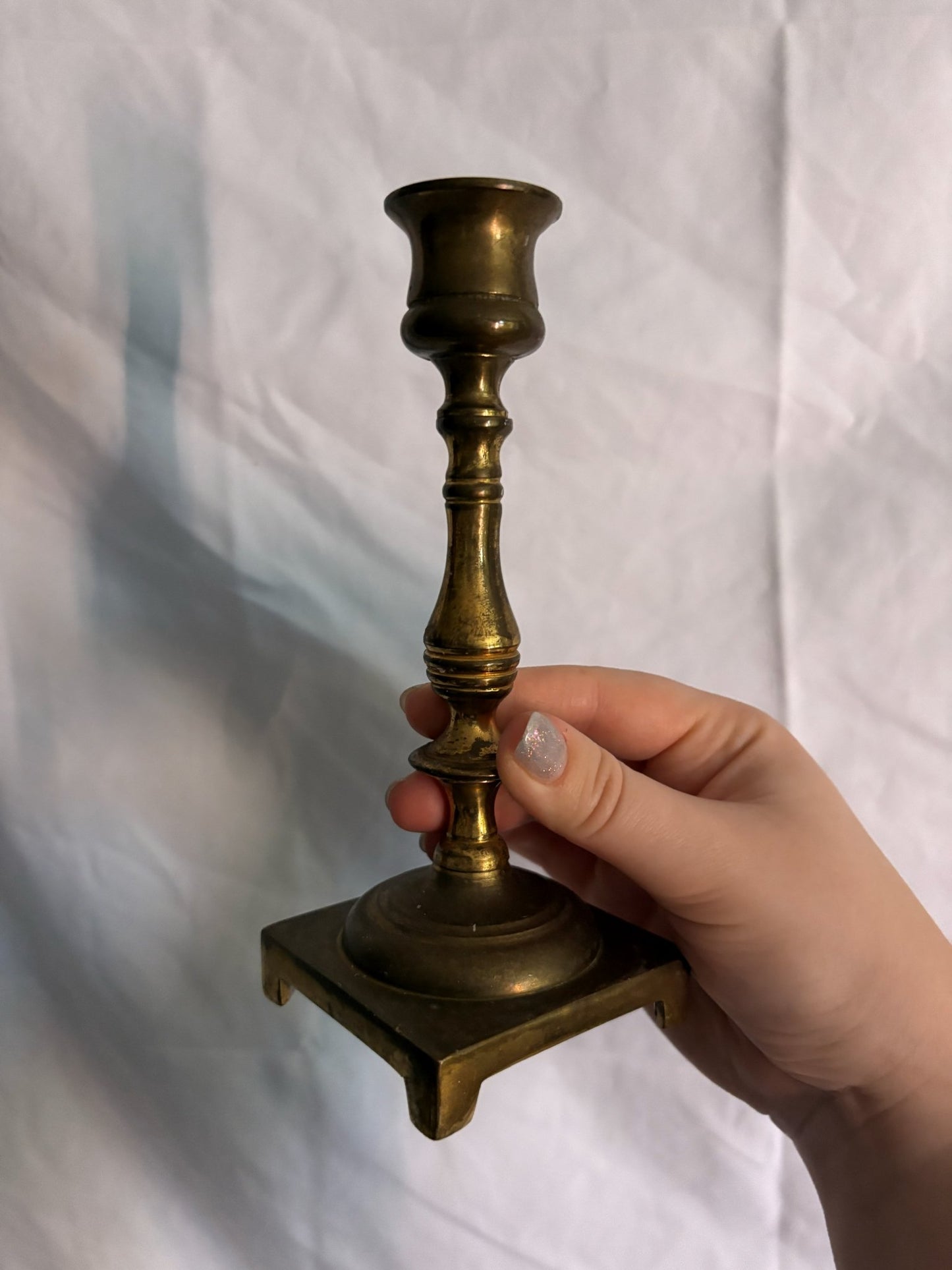 63fe71384f2da238419a4f9e_048092-brass-candlesticks-4_1767397387264.jpg