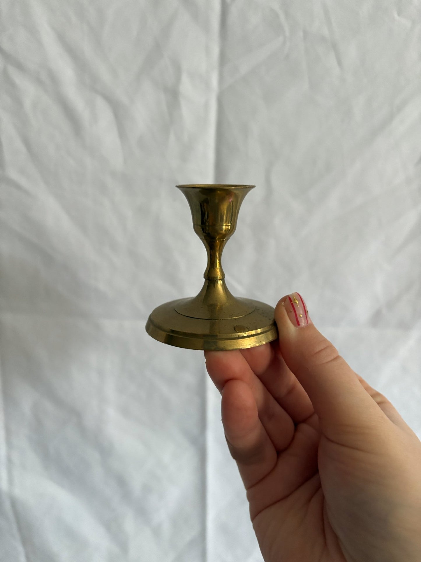 63fe71384f2da238419a4f9e_048092-short-round-brass-candlesticks-2_1767397387266.jpg