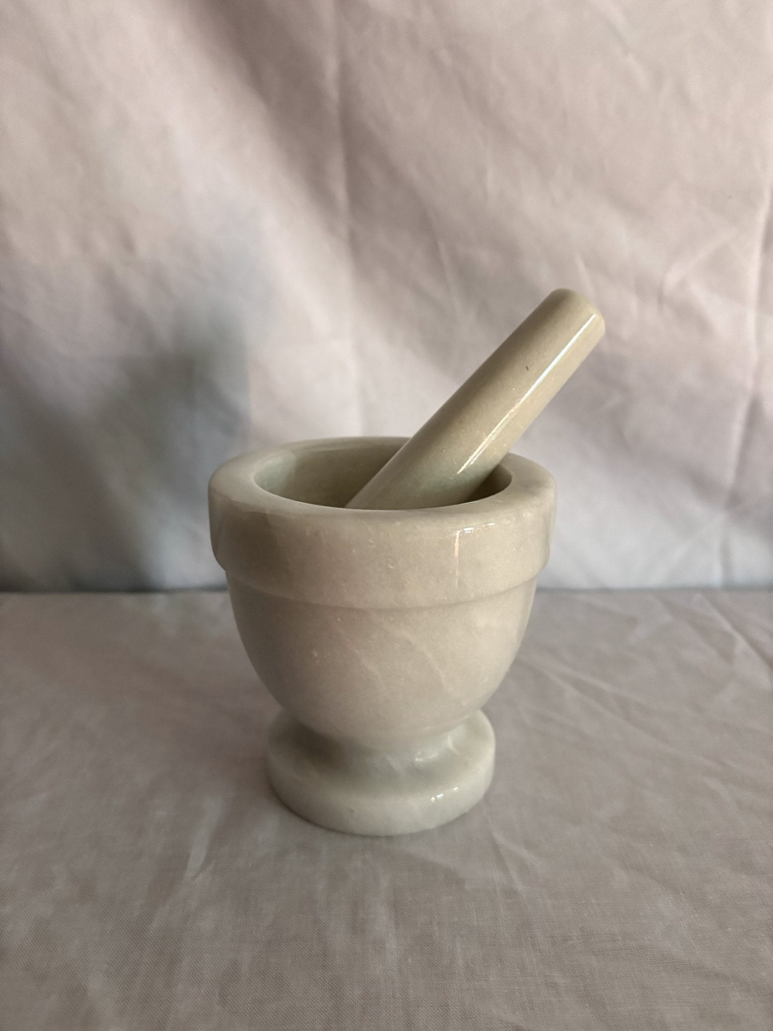 63fe71384f2da238419a4f9e_048099-marble-mortar-pestle-1_1767398305792.jpg