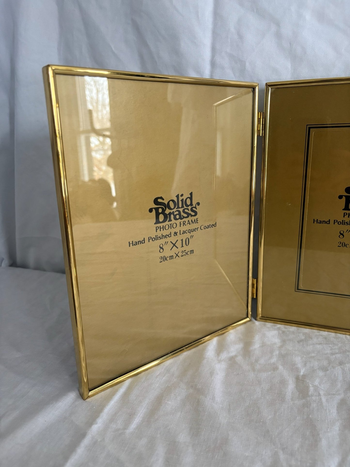 63fe71384f2da238419a4f9e_048106-brass-bifold-picture-frame-2_1767403986240.jpg