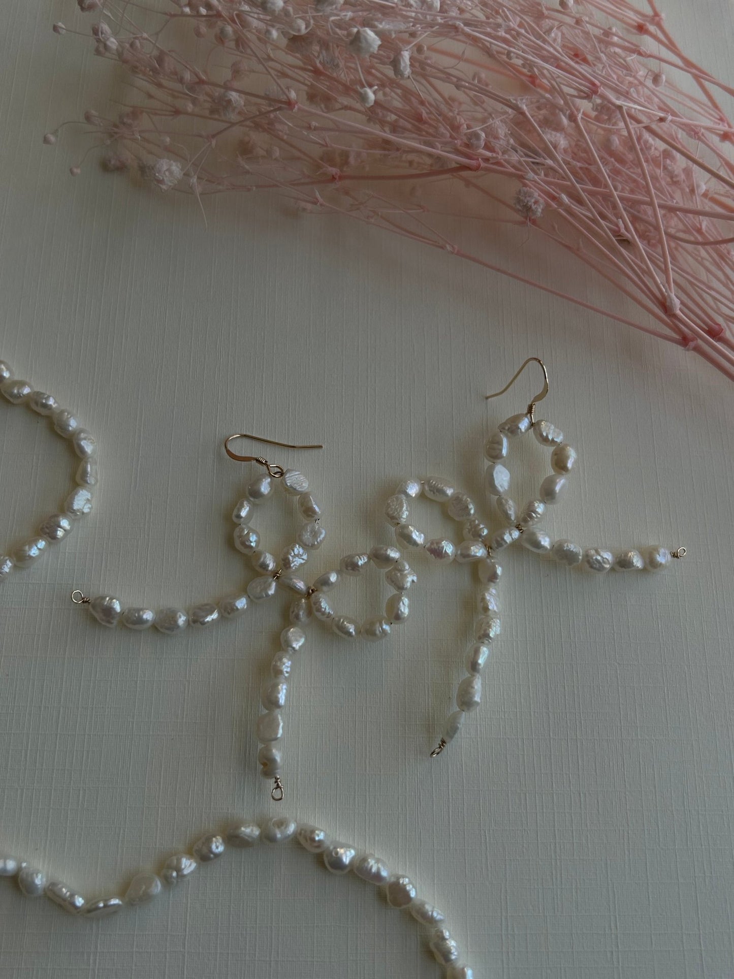 003025 - Pearl Bowtie Dangles