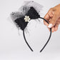 63fe71384f2da238419a4f9e_black-bow-girls-headband_1788455280139.jpg