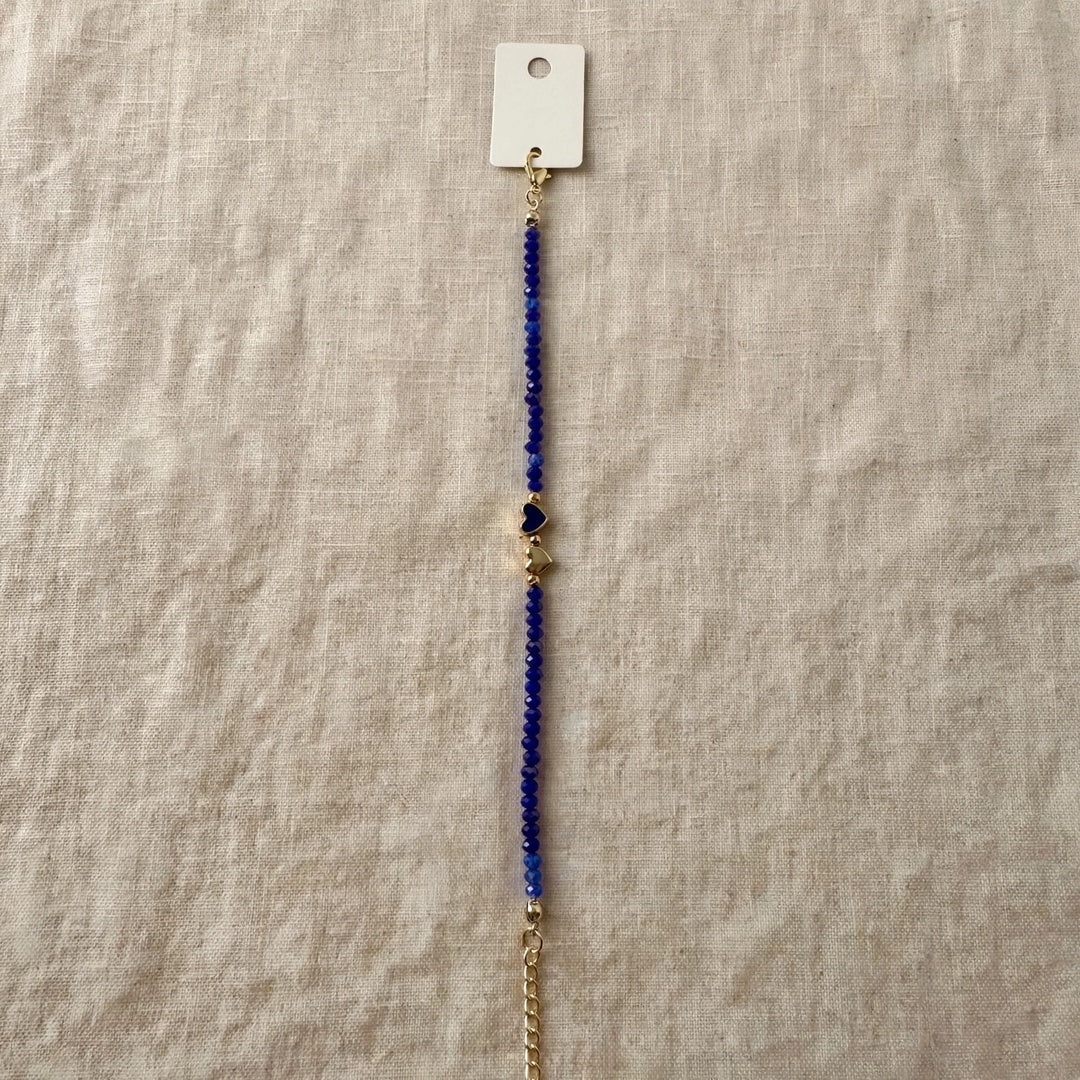 63fe71384f2da238419a4f9e_blue-beaded-bracelet-centered-1080_1789072318455.jpeg