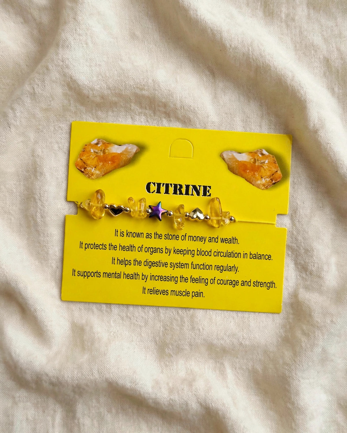 63fe71384f2da238419a4f9e_citrine-bracelet-linen-flatlay-hq_1789049799723.jpeg