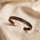 63fe71384f2da238419a4f9e_cuff-greek-black-copper-hq_1789004762705.jpeg