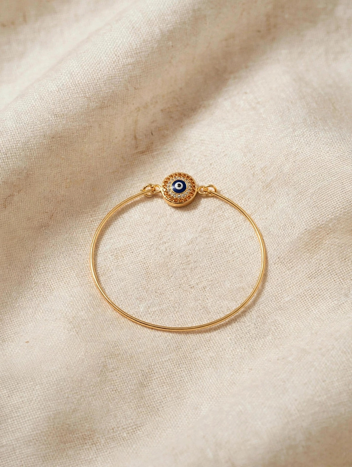 63fe71384f2da238419a4f9e_evil-eye-bracelet-linen-hq_1789063874224.jpeg