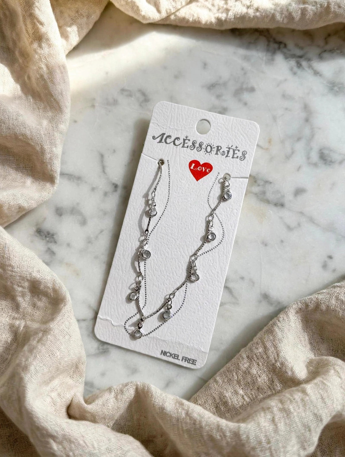 63fe71384f2da238419a4f9e_flat-lay-jewelry-card-hq_1789058296823.jpeg