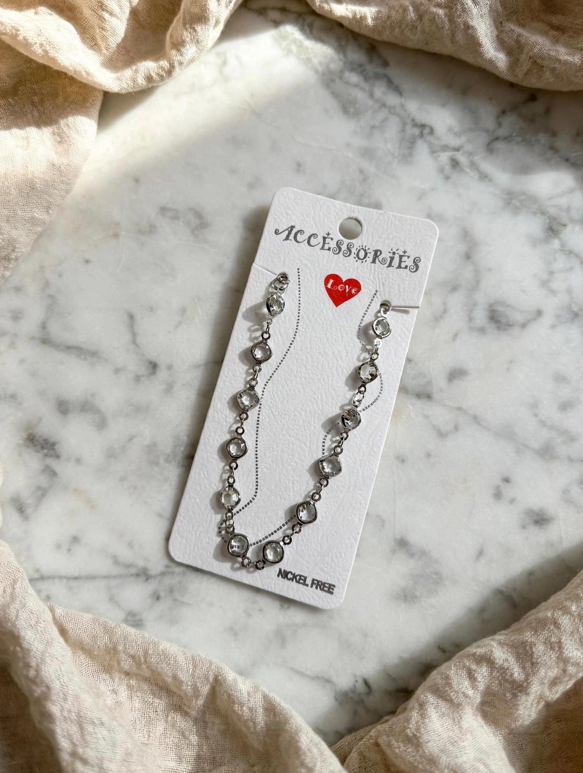 63fe71384f2da238419a4f9e_flat-lay-necklace-card-hq_1789058296823.jpeg