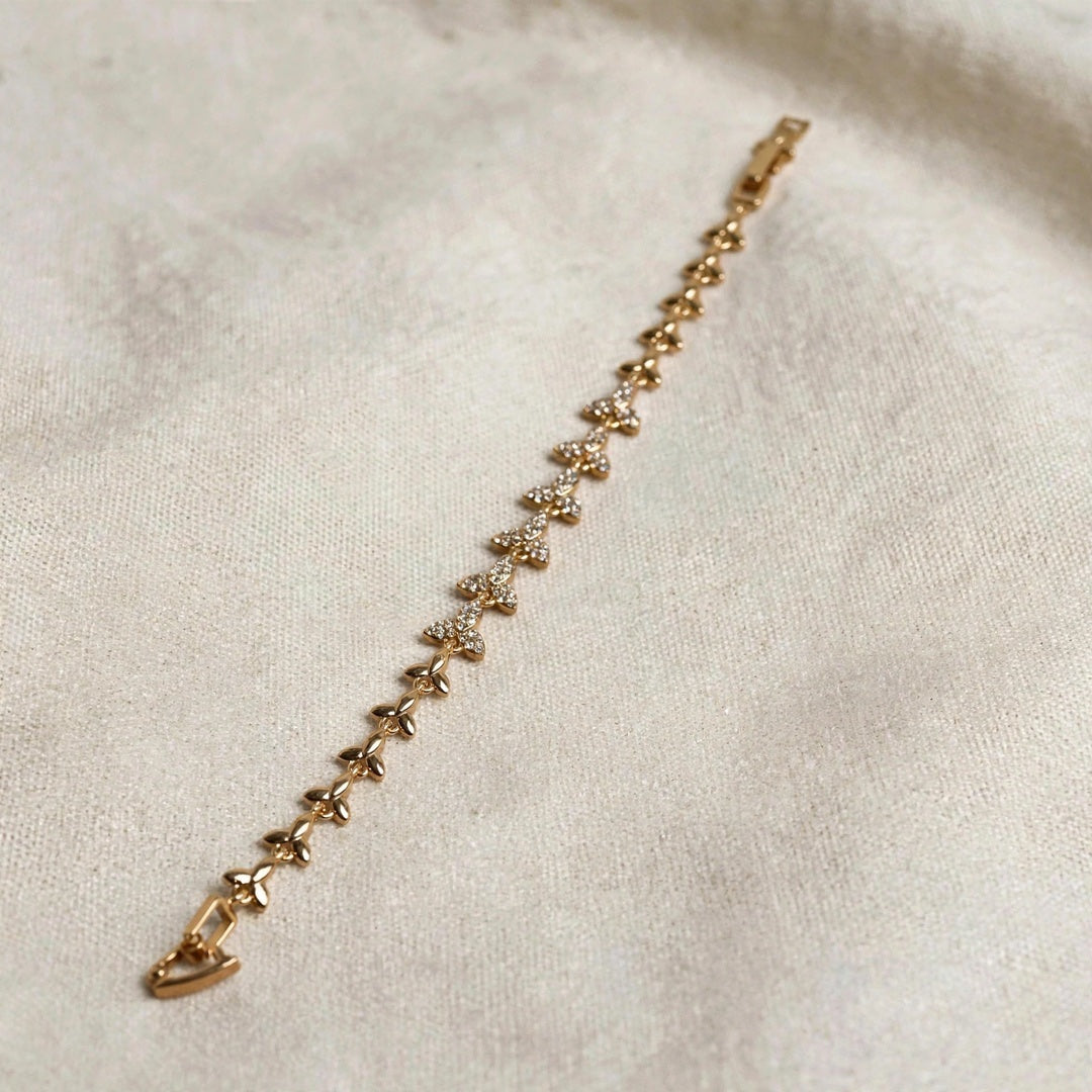 63fe71384f2da238419a4f9e_gold-butterfly-bracelet-linen-1080_1789082434072.jpeg