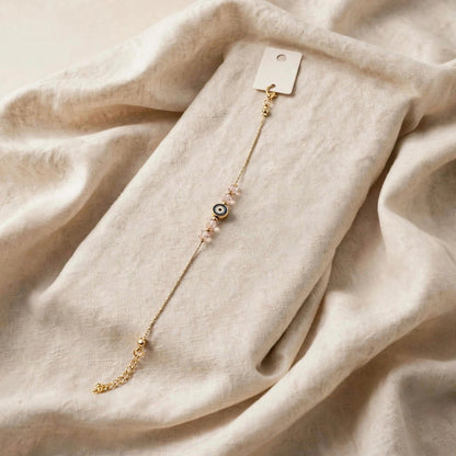 63fe71384f2da238419a4f9e_gold-evil-eye-bracelet-1-1080_1789070691659.jpeg