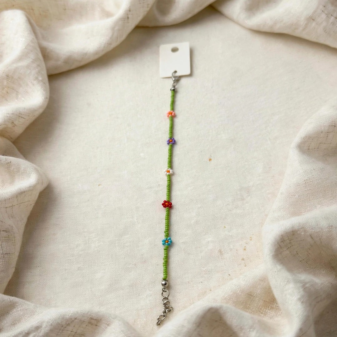 63fe71384f2da238419a4f9e_green-beaded-bracelet-1080_1789069436579.jpeg