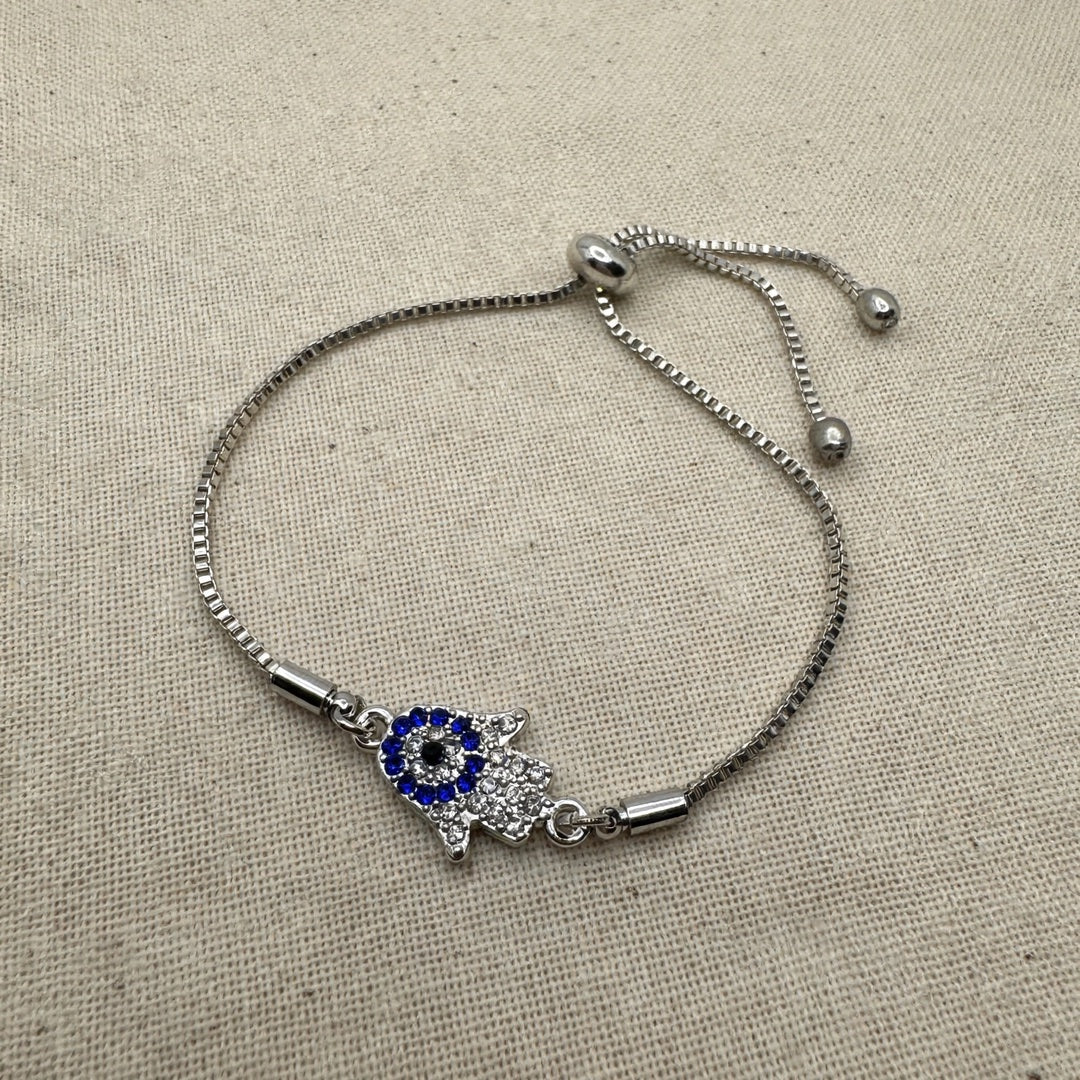63fe71384f2da238419a4f9e_hamsa-bracelet-linen-1080_1789106915694.jpeg