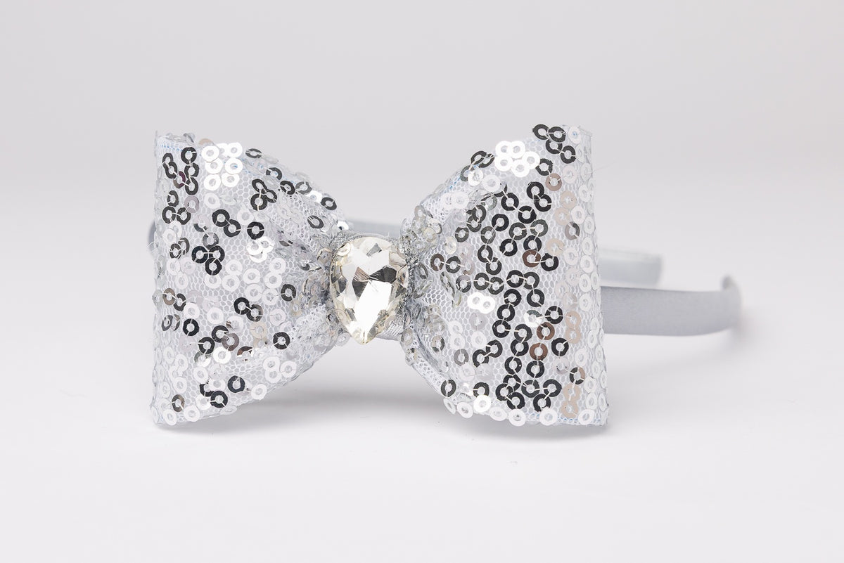 63fe71384f2da238419a4f9e_handmade-bow-headband_1788456350839.jpg