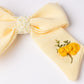 63fe71384f2da238419a4f9e_handmade-yellow-bow-for-girls_1788461815599.jpg