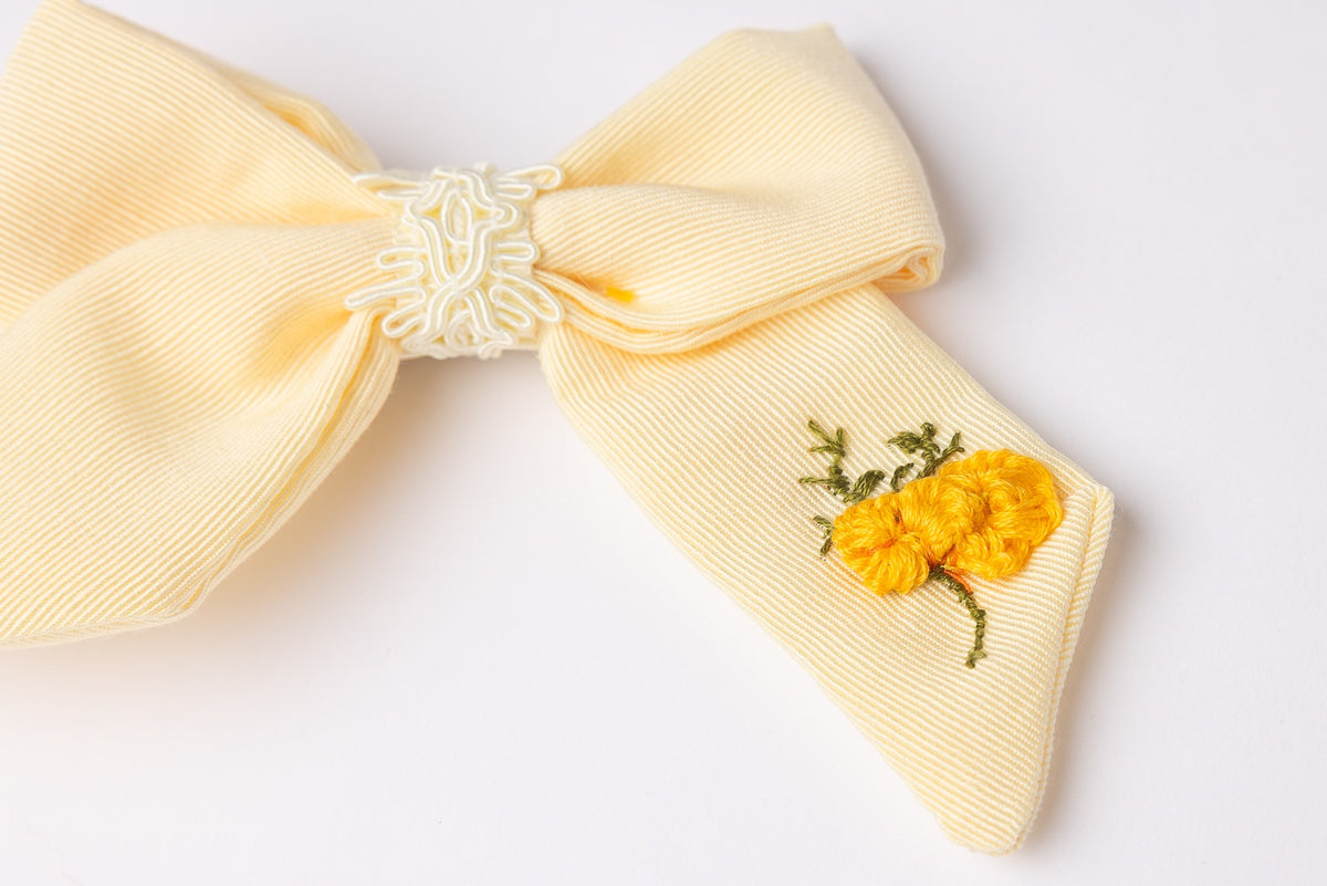 63fe71384f2da238419a4f9e_handmade-yellow-bow-for-girls_1788461815599.jpg