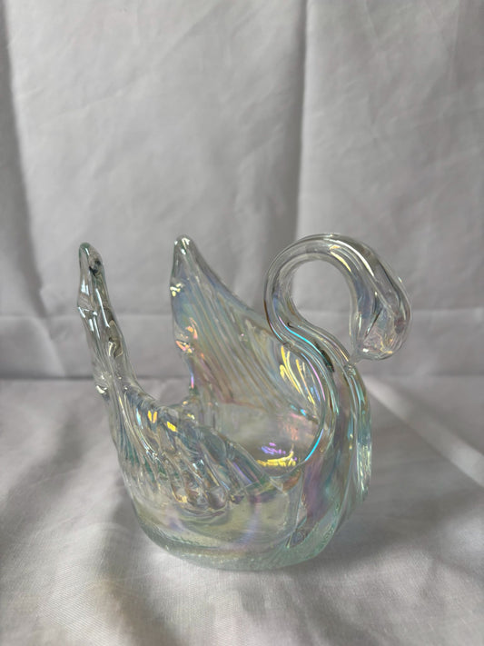 63fe71384f2da238419a4f9e_iridescent-swan-1_1750620935935.jpg