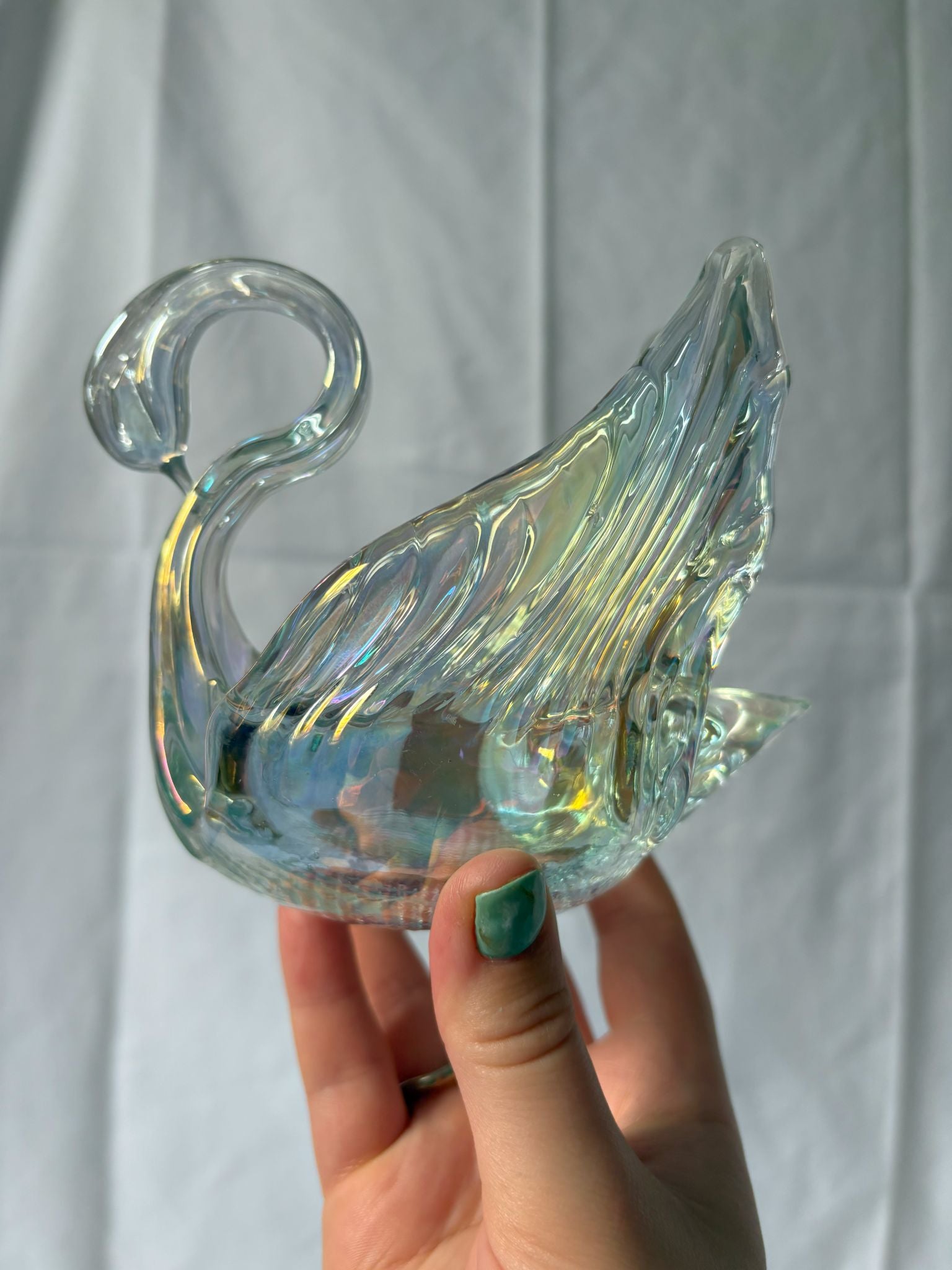 63fe71384f2da238419a4f9e_iridescent-swan-2_1750620935936.jpg