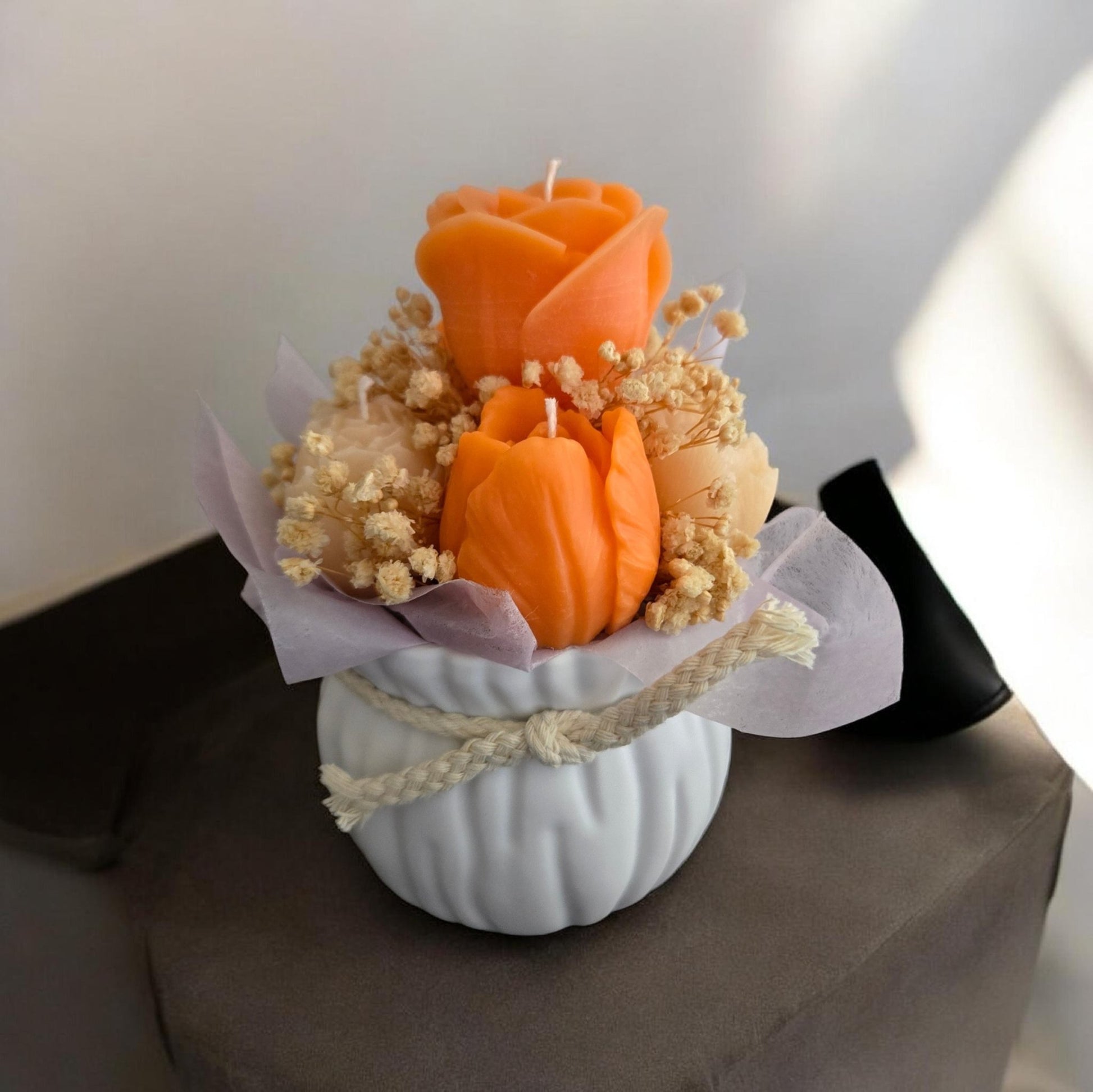 63fe71384f2da238419a4f9e_orange-candle-bouquet_1780427863866.jpg