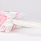 63fe71384f2da238419a4f9e_pink-and-white-kids-accessory_1788454413853.jpg