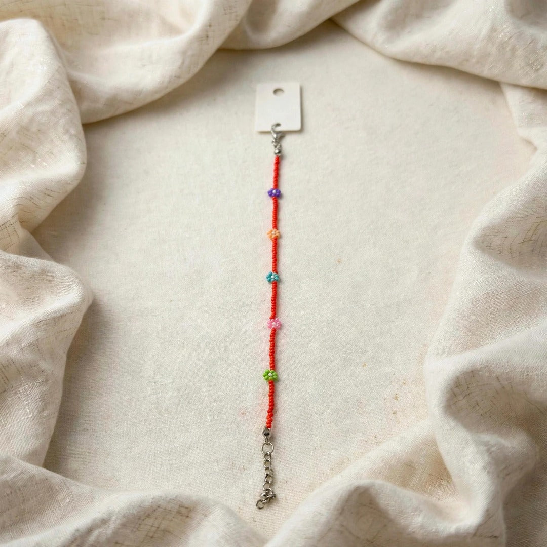 63fe71384f2da238419a4f9e_red-beaded-bracelet-1-1080_1789067718546.jpeg