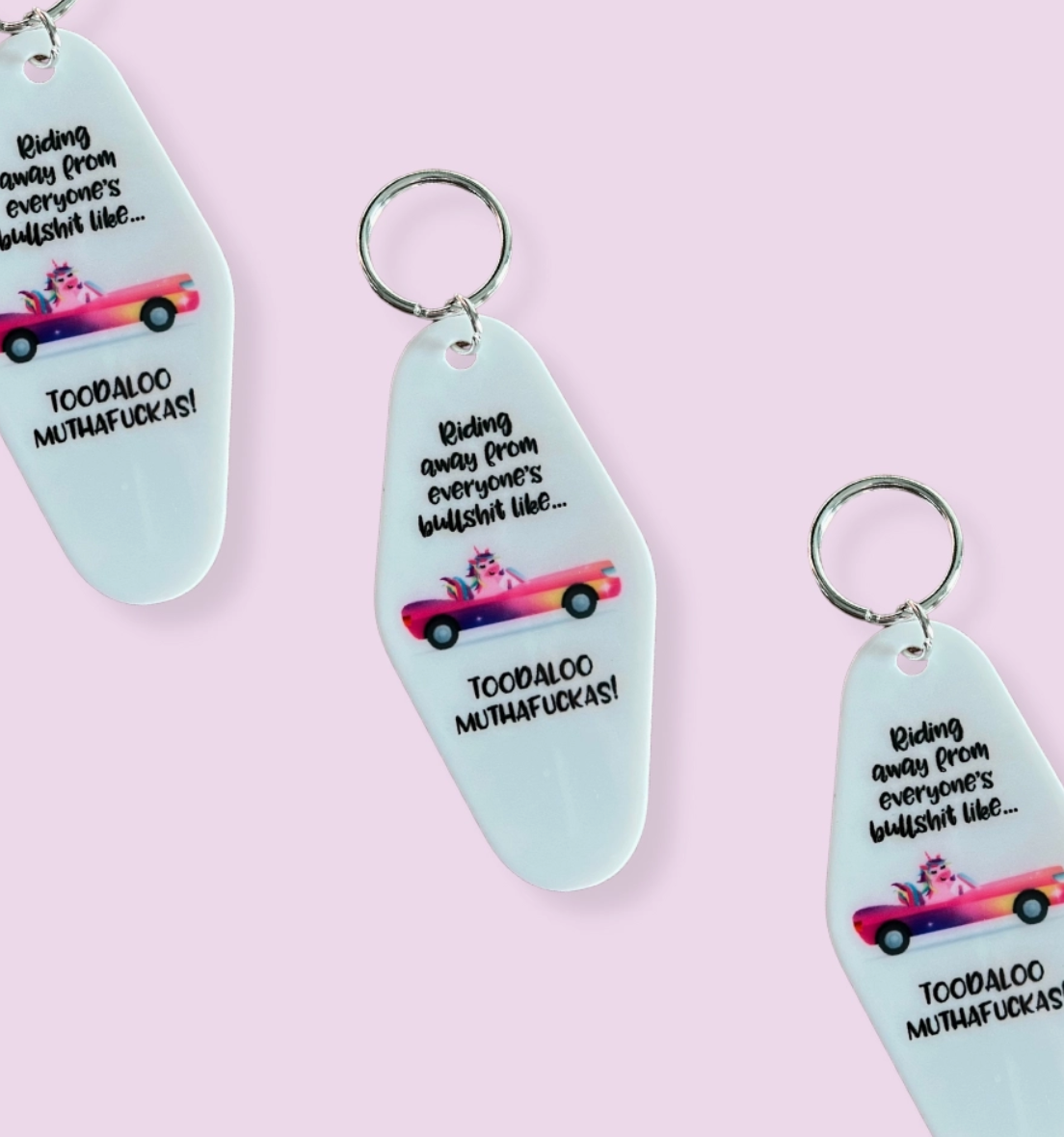 024055 Riding away - Motel keychain
