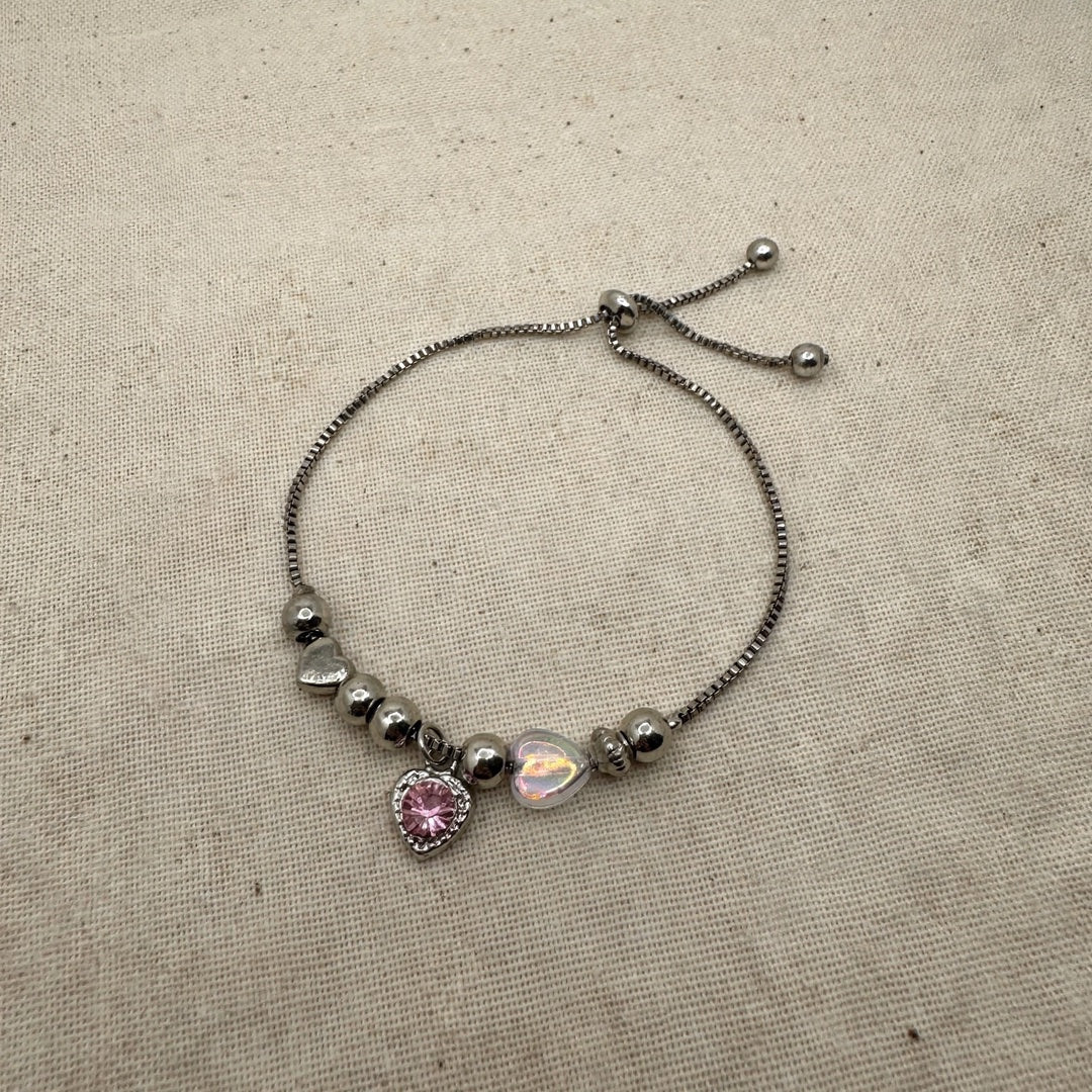 63fe71384f2da238419a4f9e_silver-bracelet-linen-flatlay-1080_1789106915694.jpeg