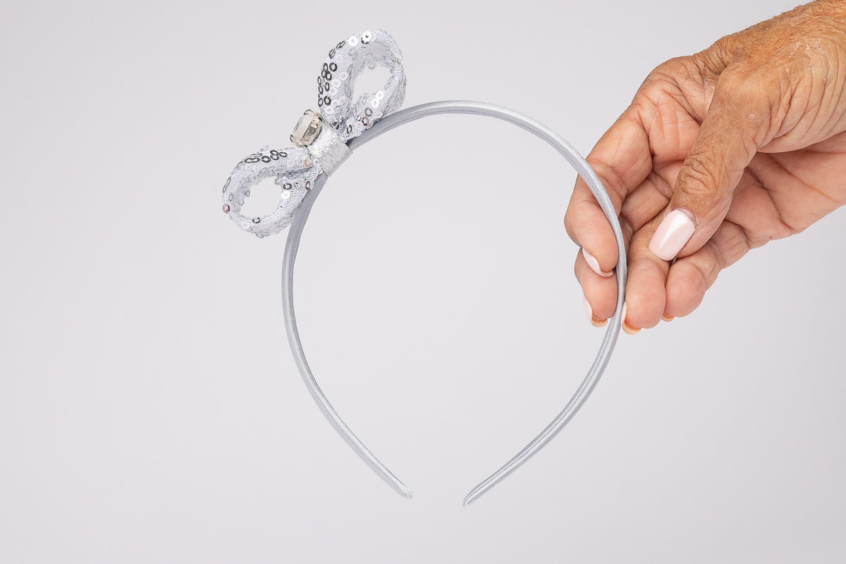 63fe71384f2da238419a4f9e_silver-girls-bow-headband_1788456350839.jpg
