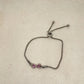 63fe71384f2da238419a4f9e_silver-heart-bracelet-linen-1-1080_1789106915694.jpeg