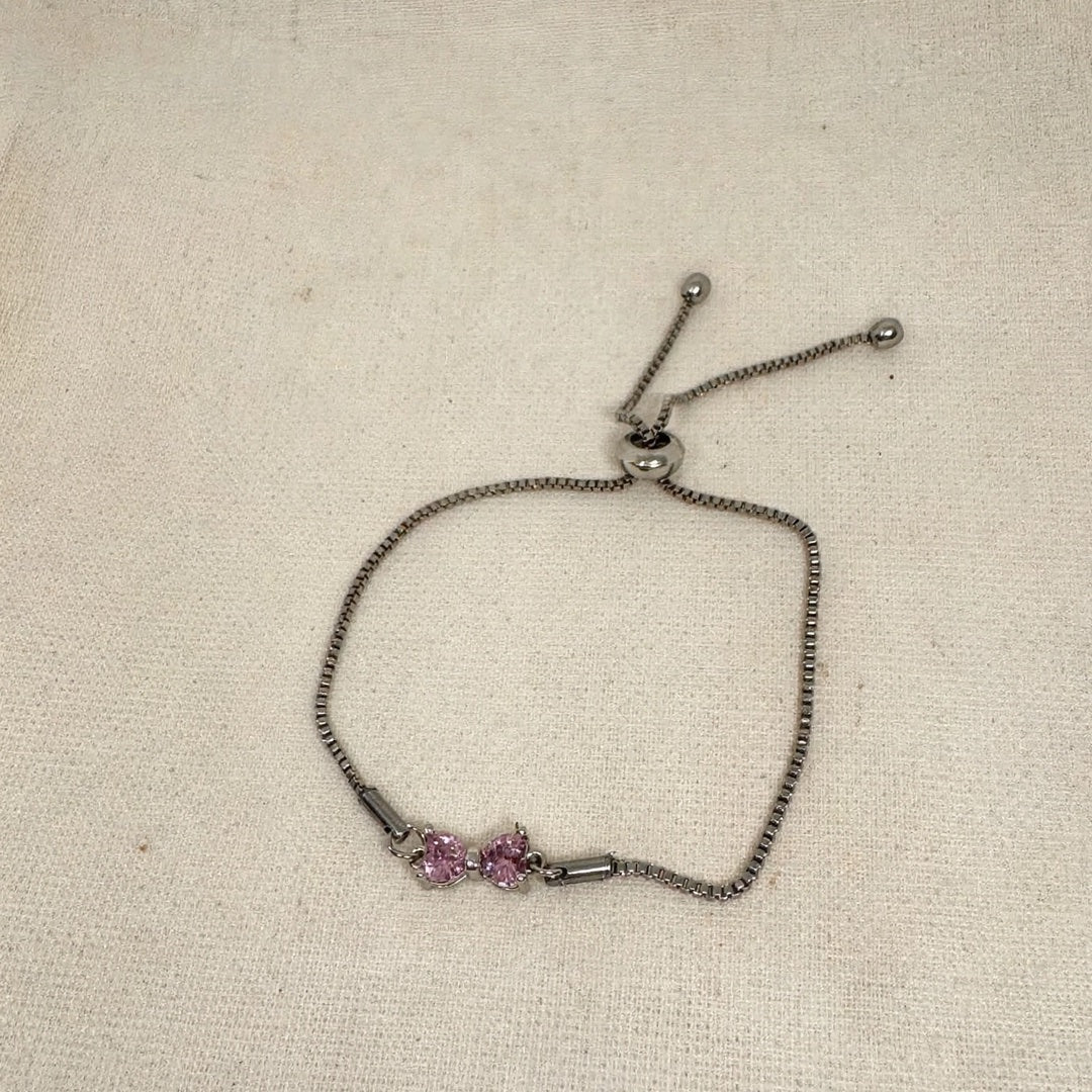 63fe71384f2da238419a4f9e_silver-heart-bracelet-linen-1-1080_1789106915694.jpeg