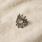 63fe71384f2da238419a4f9e_silver-sunburst-ring-linen-hq_1788986750129.jpeg