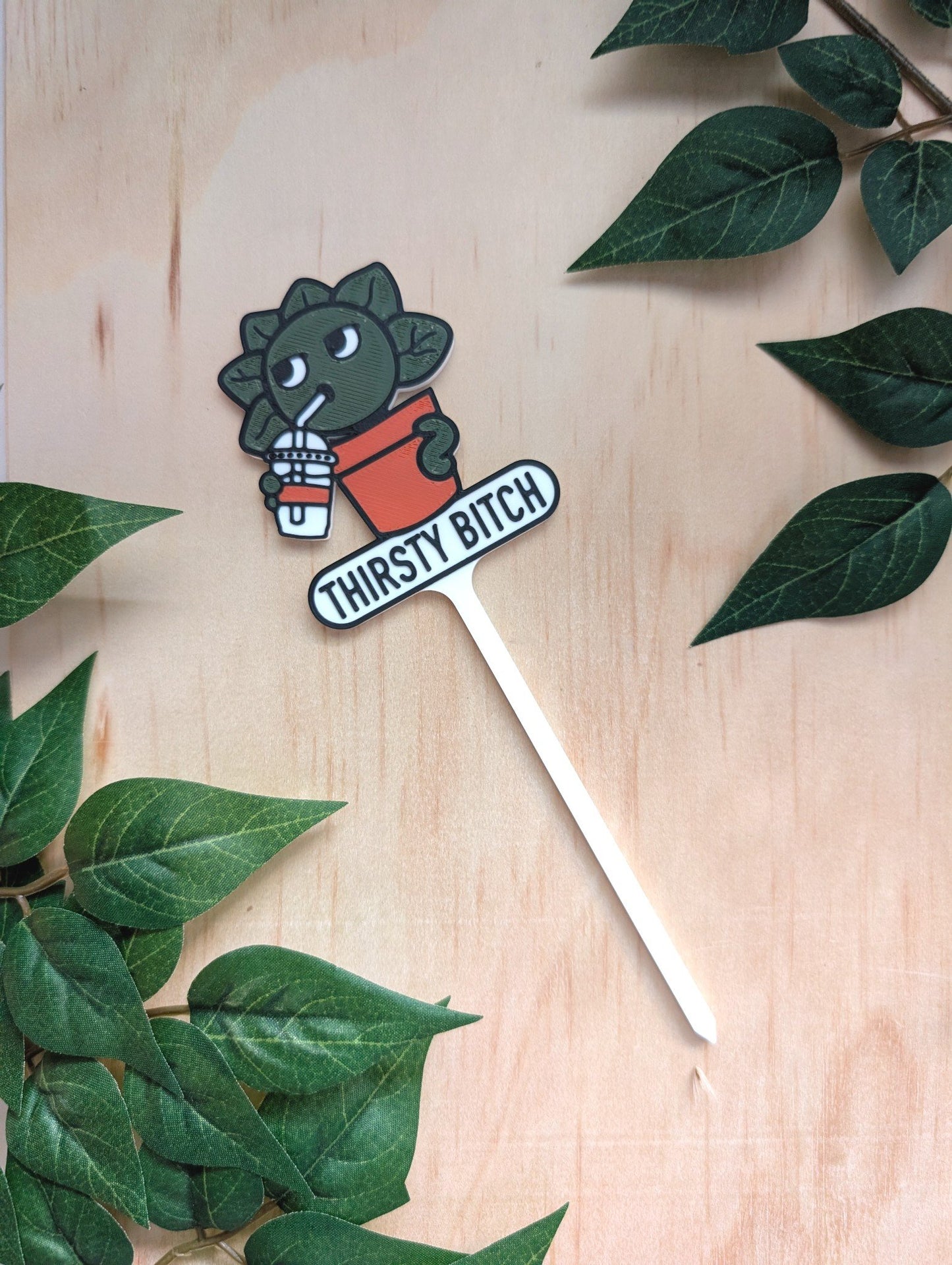 63fe71384f2da238419a4f9e_thirsty-bitch-plant-tag_1765575656664.jpg