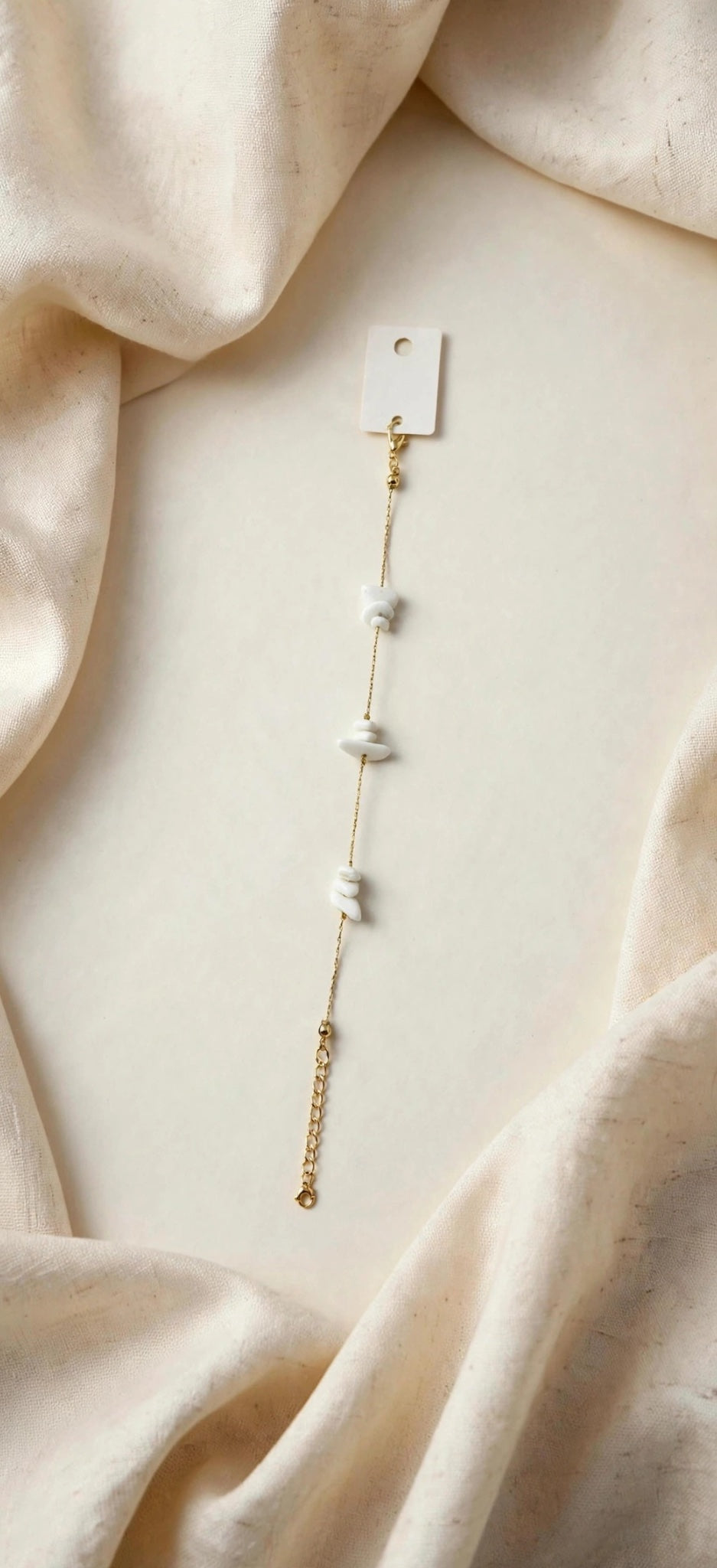 63fe71384f2da238419a4f9e_white-chip-bracelet_1789066328199.jpeg