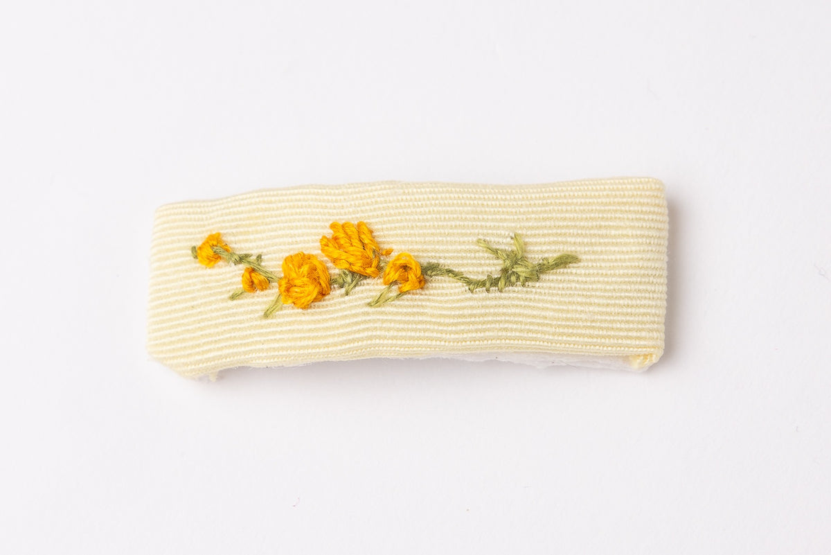 63fe71384f2da238419a4f9e_yellow-embroidery-hair-clip_1788461815599.jpg