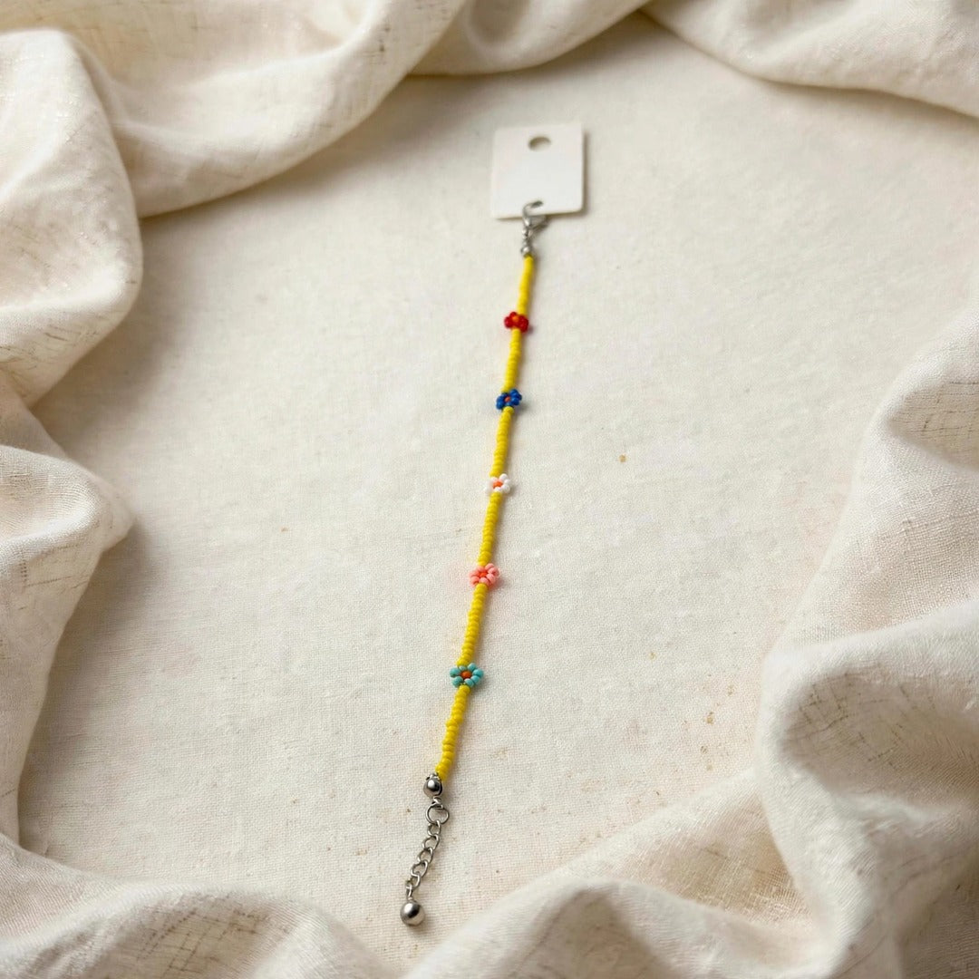 63fe71384f2da238419a4f9e_yellow-flower-bracelet-1080_1789067718545.jpeg