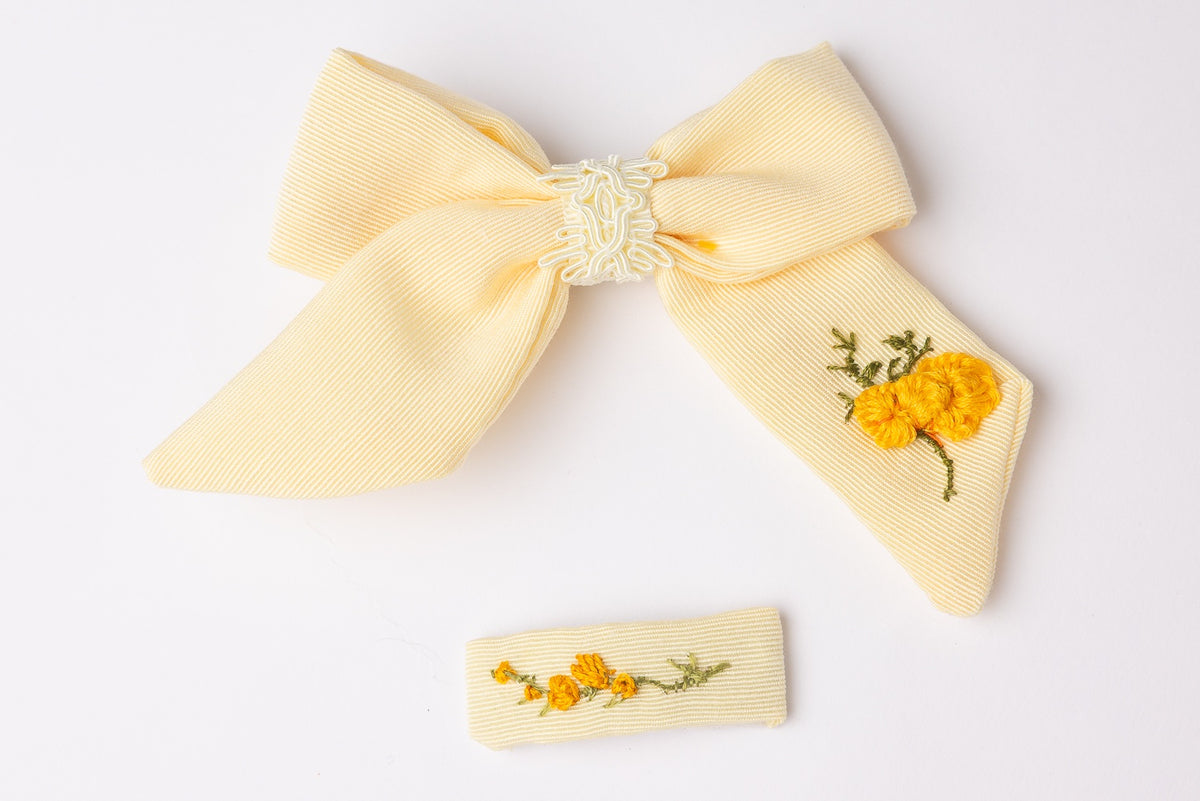 63fe71384f2da238419a4f9e_yellow-hair-bow-and-clip-set_1788461815599.jpg